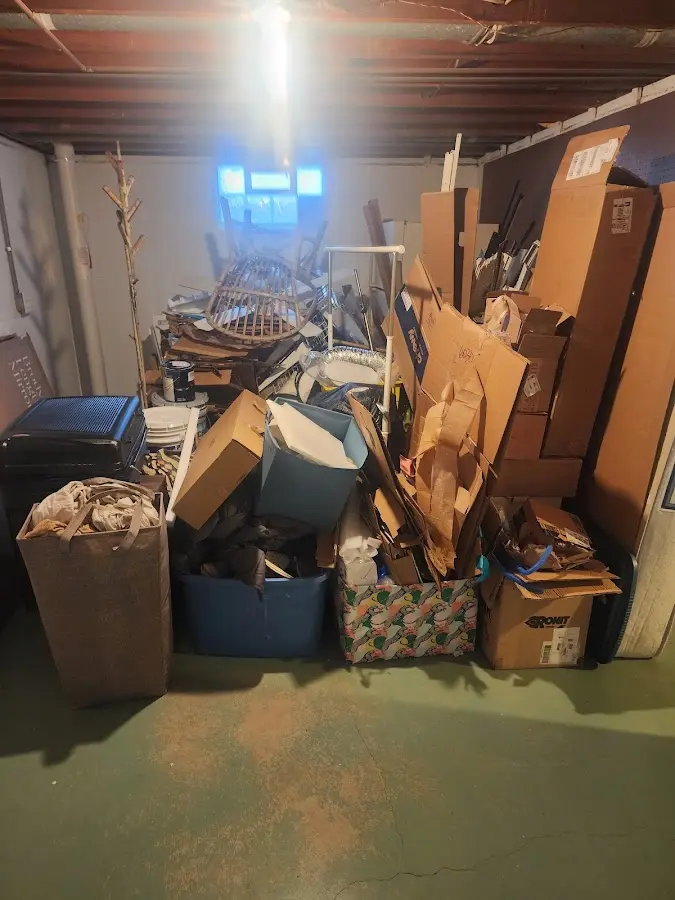 Roll-off dumpster container at job site for Yard Waste Dumpster Rental in Manitou Springs